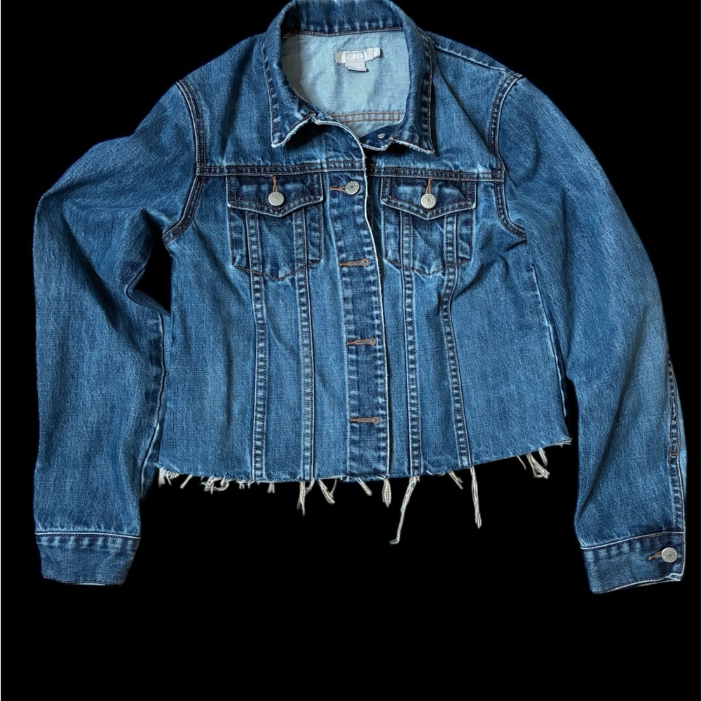 Woman’s blue denim jeans jacket with Raw Hem